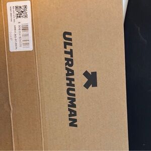 NIB Ultrahuman SZ7 Gold wearable ring with SZ charger